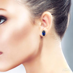 5x3 MM Oval Cut Sapphire Stud Earrings in 14K Yellow Gold