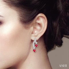 4x3 MM Oval Cut Ruby and 1/5 Ctw Round Cut Diamond Precious Earrings in 14K White Gold