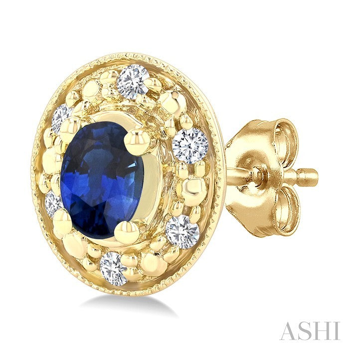 4x3 MM Oval Shaped Sapphire and 1/10 Ctw Round Cut Diamond Earrings in 14K Yellow Gold