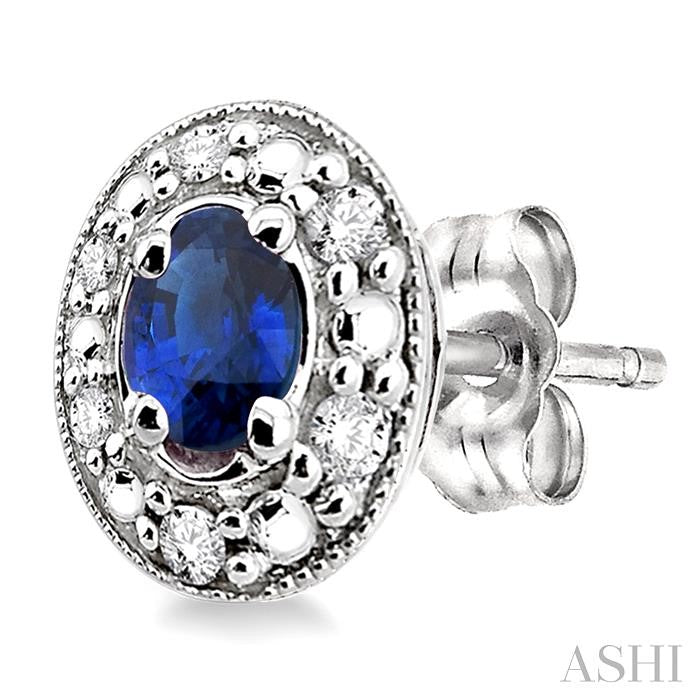 4x3 MM Oval Shaped Sapphire and 1/10 Ctw Round Cut Diamond Earrings in 10K White Gold