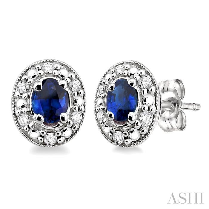 4x3 MM Oval Shaped Sapphire and 1/10 Ctw Round Cut Diamond Earrings in 10K White Gold
