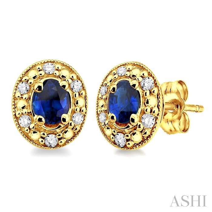 4x3 MM Oval Shaped Sapphire and 1/10 Ctw Single Cut Diamond Earrings in 10K Yellow Gold
