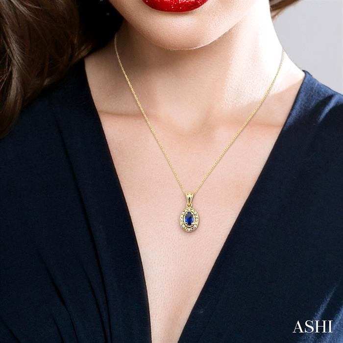 5x3 MM Oval Shape Sapphire and 1/20 Ctw Round Cut Diamond Pendant in 14K Yellow Gold with Chain