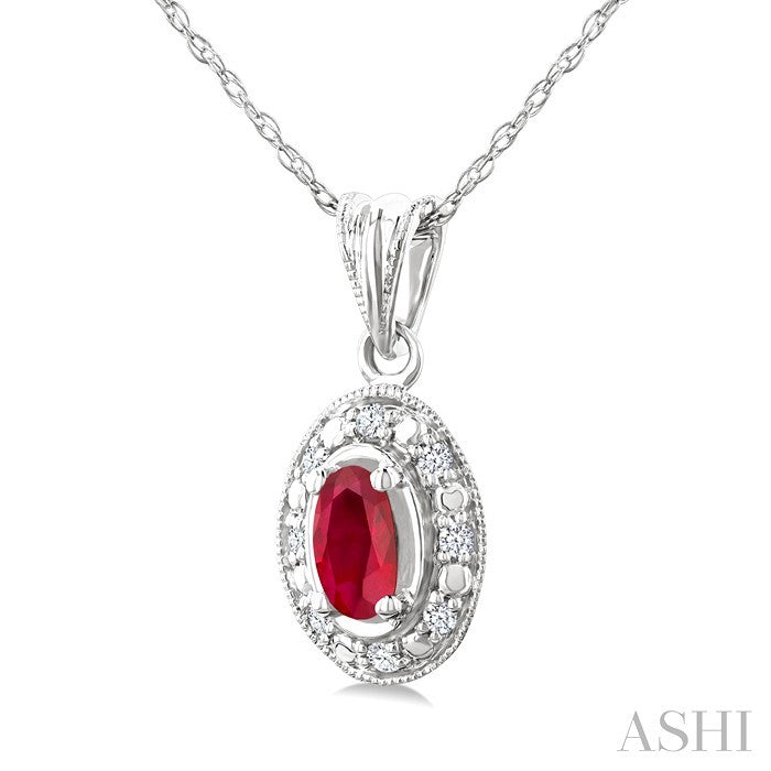 5x3 MM Oval Shape Ruby and 1/20 Ctw Round Cut Diamond Pendant in 10K White Gold with Chain.