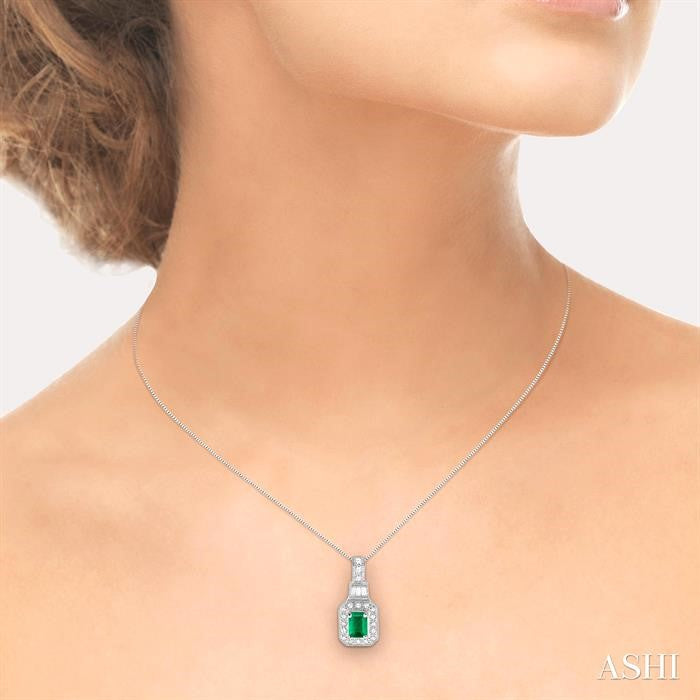 7x5 MM Emerald Shape Emerald and 1/2 ctw Round and Baguette Cut Diamond Pendant in 14K White Gold with Chain