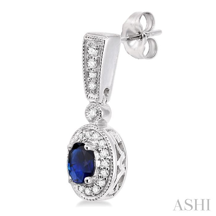 5x3 MM Oval Cut Sapphire and 1/3 Ctw Round Cut Diamond Earrings in 14K White Gold