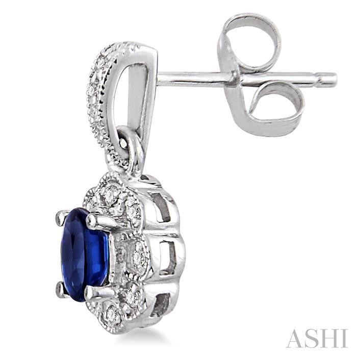 5x3 MM Oval Cut Sapphire and 1/10 Ctw Round Cut Diamond Earrings in 14K White Gold
