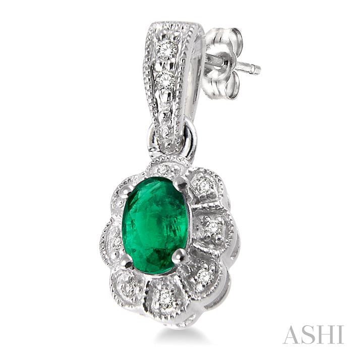 5x3 MM Oval Cut Emerald and 1/10 Ctw Single Cut Diamond Earrings in 10K White Gold