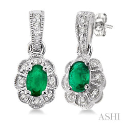 5x3 MM Oval Cut Emerald and 1/10 Ctw Round Cut Diamond Earrings in 10K White Gold