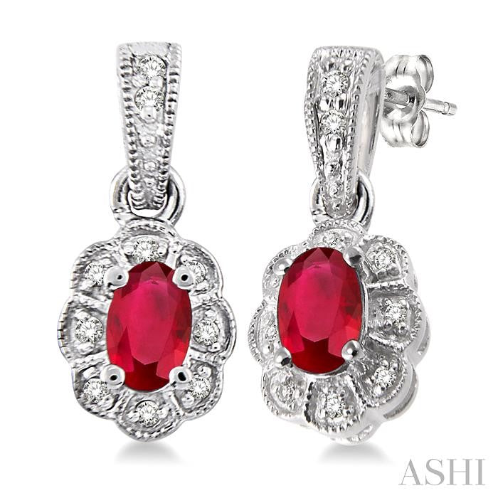 5x3 MM Oval Cut Ruby and 1/10 Ctw Single Cut Diamond Earrings in 10K White Gold
