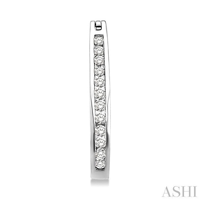1/2 Ctw Channel Set Round Cut Diamond Hoop Earrings in 10K White Gold
