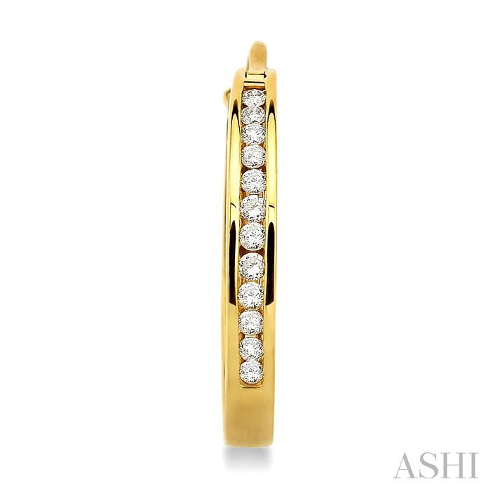 1/4 ctw Channel Set Round Cut Diamond Hoop Earrings in 14K Yellow Gold