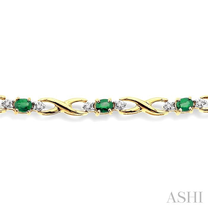 4x3 MM Oval Cut Emerald and 1/10 ctw Single Cut Diamond Bracelet in 14K Yellow Gold