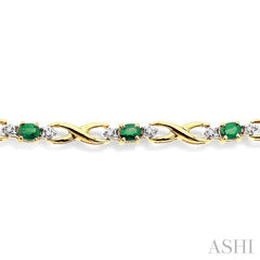 4x3 MM Oval Cut Emerald and 1/10 Ctw Round Cut Diamond Bracelet in 14K Yellow Gold