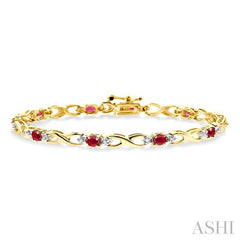 4x3 MM Oval Cut Ruby and 1/10 ctw Single Cut Diamond Bracelet in 14K Yellow Gold