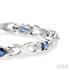 4x3 MM Oval Cut Sapphire and 1/10 ctw Single Cut Diamond Bracelet in 14K White Gold