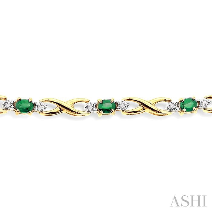 4x3 MM Oval Cut Emerald and 1/10 ctw Single Cut Diamond Bracelet in 10K Yellow Gold