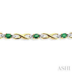 4x3 MM Oval Cut Emerald and 1/10 ctw Single Cut Diamond Bracelet in 10K Yellow Gold
