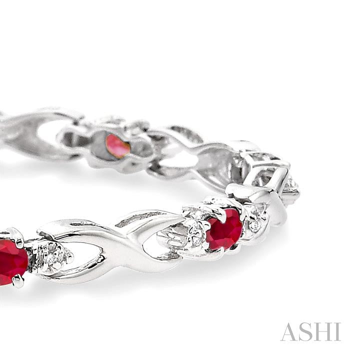 4x3 MM Oval Cut Ruby and 1/10 Ctw Round Cut Diamond Bracelet in 10K White Gold