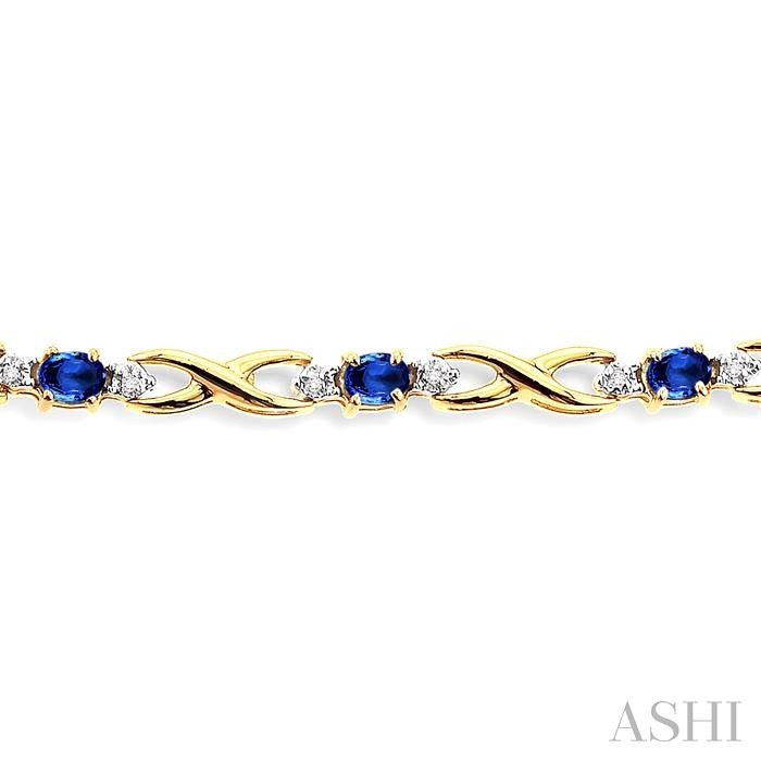 4x3 MM Oval Cut Sapphire and 1/10 Ctw Round Cut Diamond Bracelet in 10K Yellow Gold