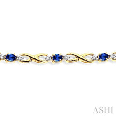 4x3 MM Oval Cut Sapphire and 1/10 ctw Single Cut Diamond Bracelet in 10K Yellow Gold