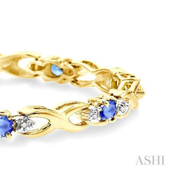 4x3mm Oval Cut Tanzanite and 1/10 Ctw Round Cut Diamond Bracelet in 10K Yellow Gold