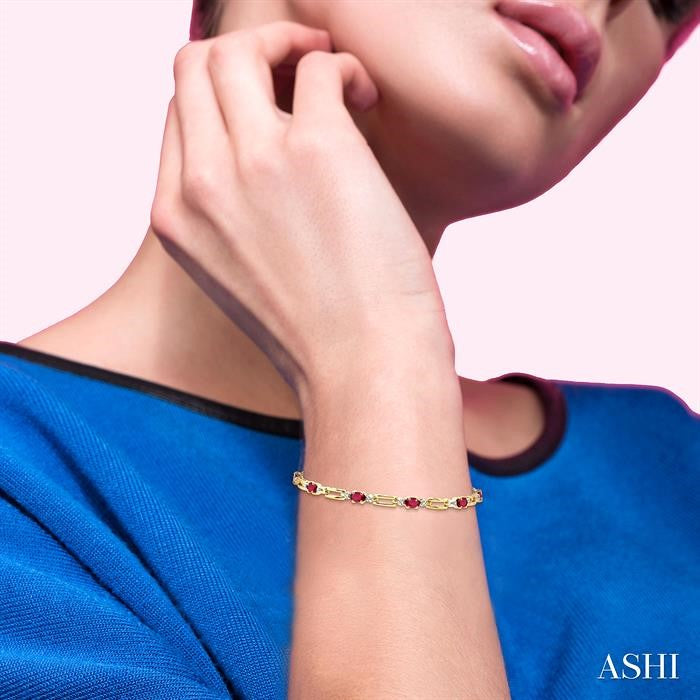 5x3 MM Oval Cut Ruby and 1/10 Ctw Round Cut Diamond Precious Bracelet in 10K Yellow Gold