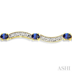 4x3 MM Oval Cut Sapphire and 1/10 Ctw Round Cut Diamond Bracelet in 14K Yellow Gold