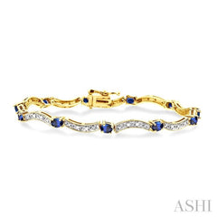 4x3 MM Oval Cut Sapphire and 1/10 ctw Single Cut Diamond Bracelet in 14K Yellow Gold