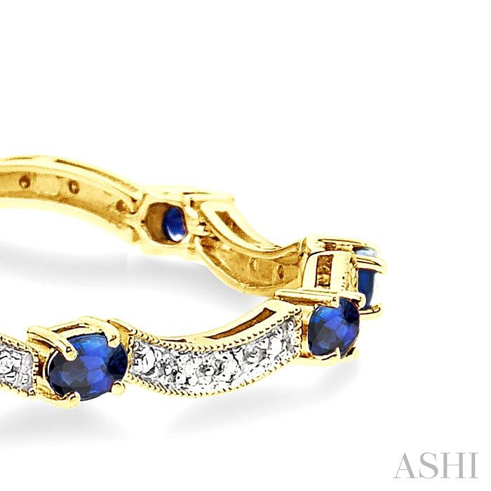 4x3 MM Oval Cut Sapphire and 1/10 Ctw Round Cut Diamond Bracelet in 14K Yellow Gold