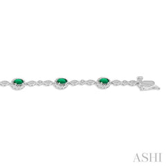5x3 MM Oval Cut Emerald and 1/20 ctw Single Cut Diamond Bracelet in 14K White Gold