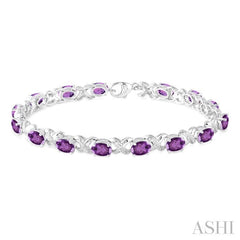 7x5 MM Oval Cut Amethyst and 1/20 Ctw Round Cut Diamond Fashion Bracelet in Sterling Silver