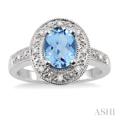 8x6 MM Oval Cut Blue Topaz and 1/20 Ctw Round Cut Diamond Ring in Sterling Silver