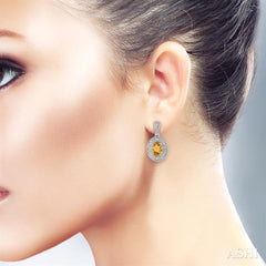 7x5 MM Oval Cut Citrine and 1/20 Ctw Round Cut Diamond Earrings in Sterling Silver