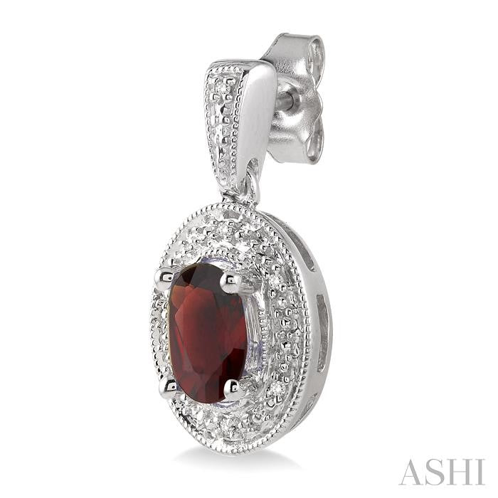 7x5 MM Oval Cut Garnet and 1/20 Ctw Round Cut Diamond Earrings in Sterling Silver