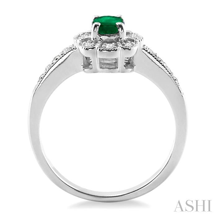 6x4 MM Oval Cut Emerald and 1/20 Ctw Round Cut Diamond Ring in Sterling Silver