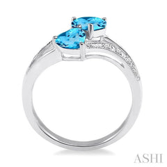 5&6 MM Heart Shape Blue Topaz and 1/50 Ctw Round Cut Diamond Ring in Sterling Silver