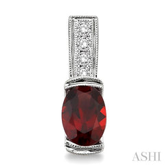 7x5 MM Oval Cut Garnet and 1/50 Ctw Round Cut Diamond Earrings in Sterling Silver