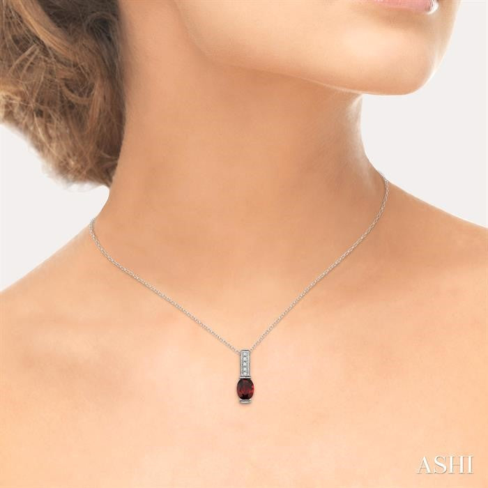 8x6 MM Oval Cut Garnet and 1/50 Ctw Round Cut Diamond Pendant in Sterling Silver with Chain