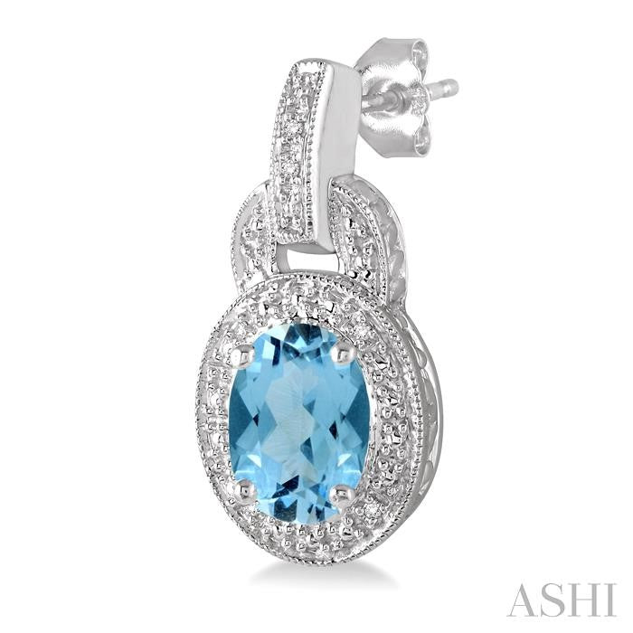8x6 MM Oval Cut Blue Topaz and 1/20 Ctw Round Cut Diamond Earrings in Sterling Silver