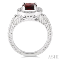 9x7 MM Oval Cut Garnet and 1/20 Ctw Round Cut Diamond Ring in Sterling Silver