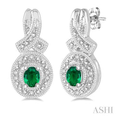 4x3 MM Oval Cut Emerald and 1/20 Ctw Round Cut Diamond Earrings in Sterling Silver