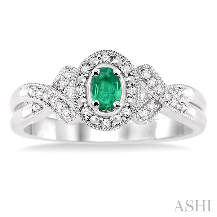 5x3 MM Oval Cut Emerald and 1/50 Ctw Round Cut Diamond Ring in Sterling Silver