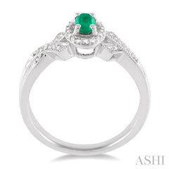 5x3 MM Oval Cut Emerald and 1/50 Ctw Round Cut Diamond Ring in Sterling Silver