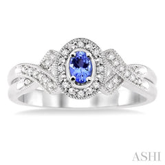 5x3 MM Oval Cut Tanzanite and 1/50 Ctw Round Cut Diamond Ring in Sterling Silver
