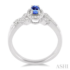 5x3 MM Oval Cut Tanzanite and 1/50 Ctw Round Cut Diamond Ring in Sterling Silver