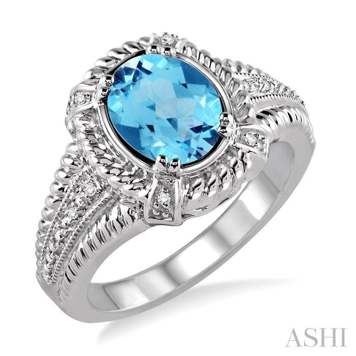 9x7 MM Oval Cut Blue Topaz and 1/50 Ctw Round Cut Diamond Ring in Sterling Silver