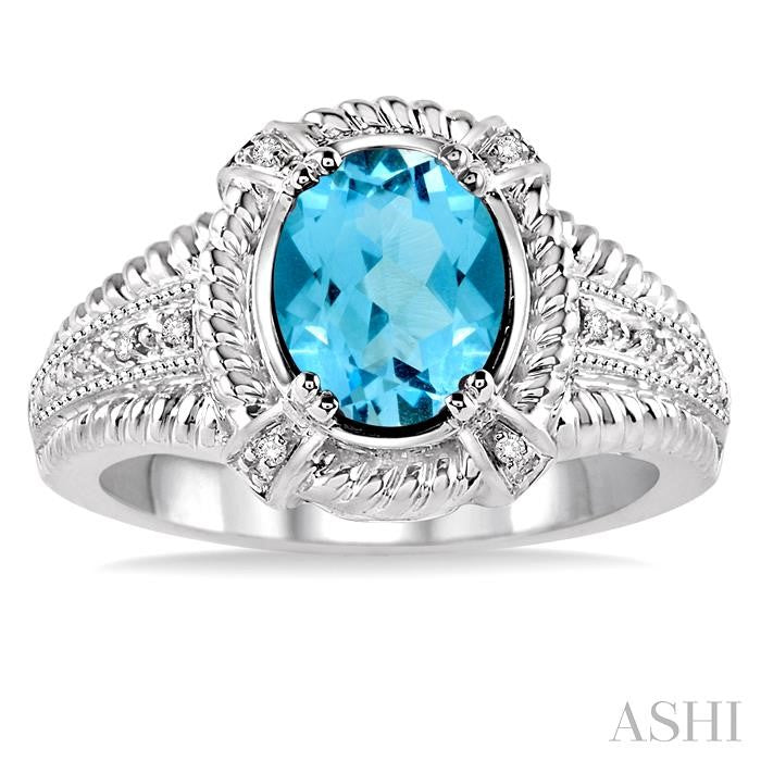 9x7 MM Oval Cut Blue Topaz and 1/50 Ctw Round Cut Diamond Ring in Sterling Silver