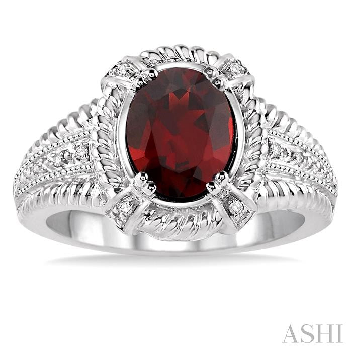 9x7 MM Oval Cut Garnet and 1/50 Ctw Round Cut Diamond Ring in Sterling Silver