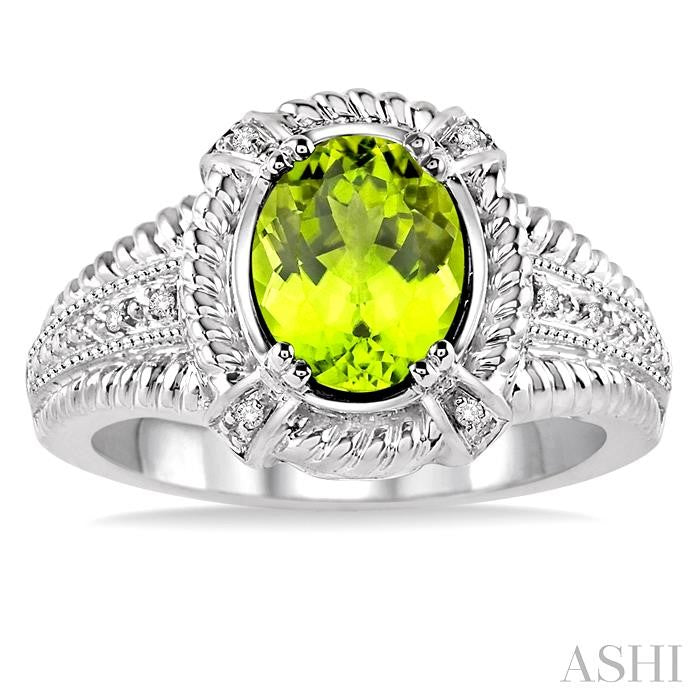 9x7 MM Oval Cut Peridot and 1/50 Ctw Round Cut Diamond Ring in Sterling Silver
